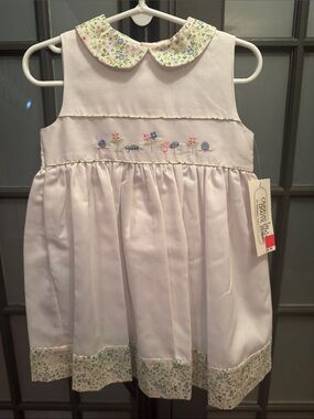 Carriage Boutique White Tag with Gold Logo and Pink Sticker